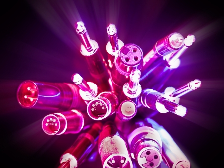 bunch of various audio cables with glow effect,for audio,wiring or connection themesの写真素材
