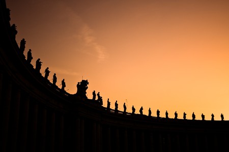 Series of statues on the top of the Vatican square.の写真素材