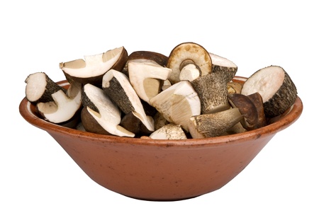  edible mushrooms chopped in a bowl,  isolated on white backgroundの写真素材