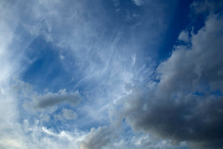Fantastic soft white clouds against blue sky 