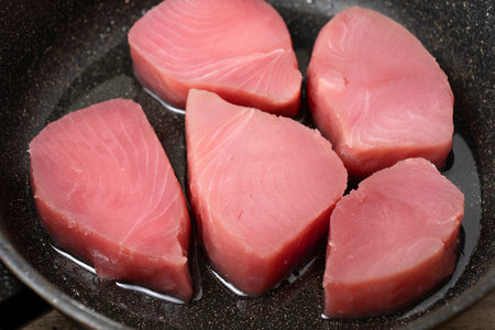 Fresh Raw tuna steak in a pan. top view. close up.の写真素材