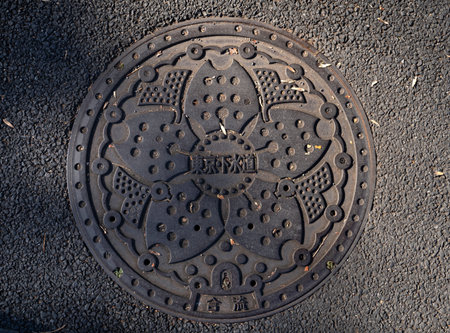 Water hatch with a pattern in Tokyo, Japan.の写真素材