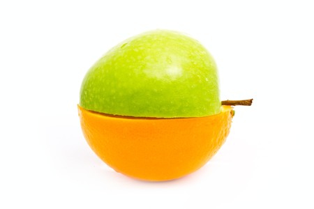 a half of green apple and orange together isolated on whiteの写真素材