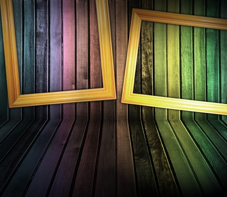 dark multicolored vintage wooden interior with frames on the wallの写真素材