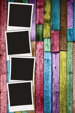 vintage wooden background with blank photosの写真素材