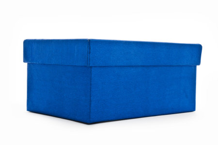 blue textured gift box isolated on whiteの写真素材