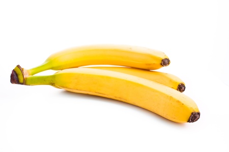close up shot of bananas isolated on whiteの写真素材
