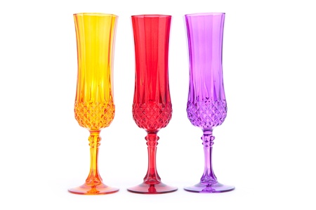 three multicolored wineglasses isolated on white backgroundの写真素材