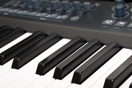 Close up shot of black & white piano keys 