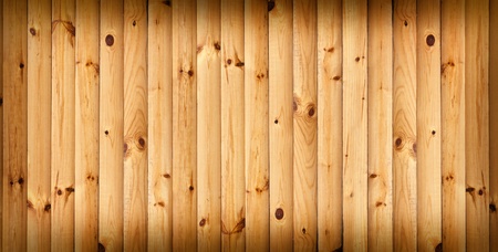 dark vintage brown wooden planks background with artistic shadows addedの写真素材