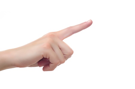 close up shot of female hand with a finger touching somethimg or pushing a button isolated on white background - shallow depth of field の写真素材