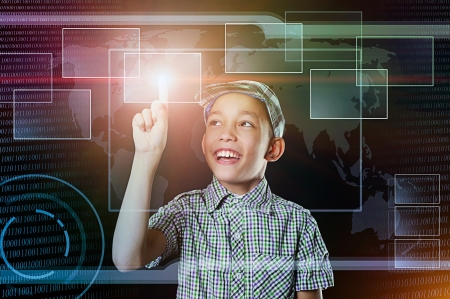 young boy touch virtual button in multicolored web intefaceの写真素材