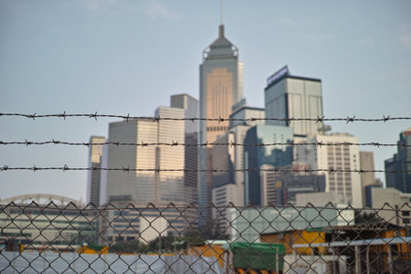 Skyscrapers, business centers, construction of concrete and glass, all Hong Kong. Hong Kong Special Administrative Region of the People's Republic of China, is a city on the southern coast of China at the Pearl River Estuary and the South China Seaのeditorial素材
