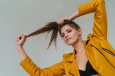 Brunette girl with long hair . Beautiful model with long hairの写真素材