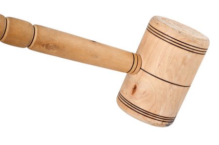 antique wooden mallet isolated on white backgroundの写真素材