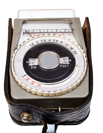Vintage photo light meter close up isolated over white backgroundの写真素材