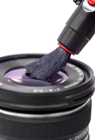 camera lens cleaning through lenspen on white backgroundの写真素材