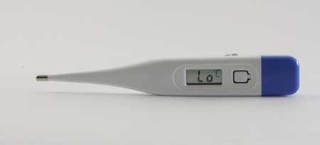 plastic electronic thermometer on the white background