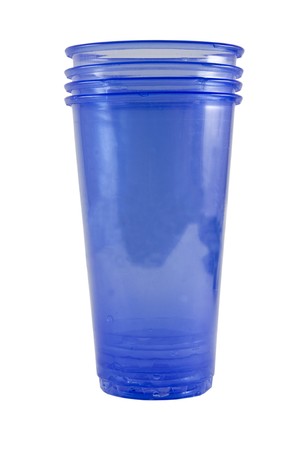 four blue plastic glassed isolated on the whiteの写真素材