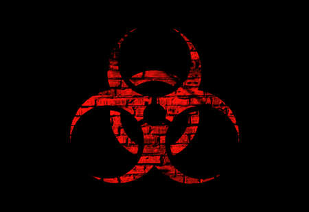 Illustration of a red biohazard symbol with a brick texture on a black background.の写真素材
