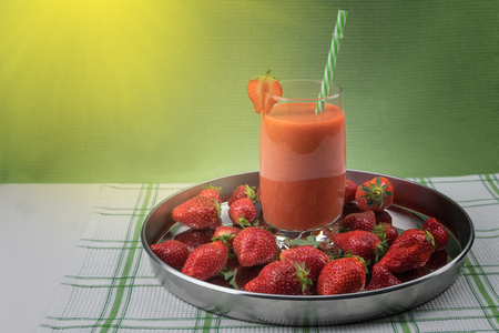Strawberry juice with berriesの写真素材