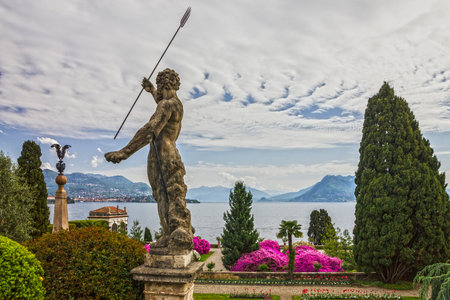 Lombardy, Italy - May 3, 2022: Neptune statue, Italy. Isola Bella garden of Borromeo palace, Lago Maggioreのeditorial素材