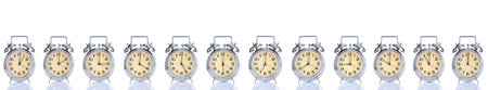 group of alarm clock with times 12 clock on white background