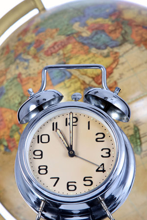 alarm clock and globe, world timeの写真素材