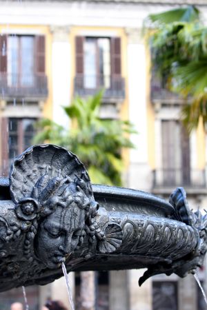 details of fountain Royal Palace in Barcelona, Spain (placa Reial)の写真素材