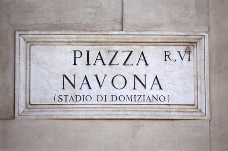 Piazza Navona sign on building wall in Rome, Italyの写真素材