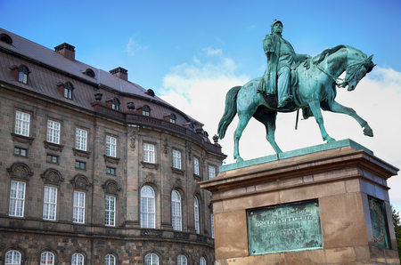 The equestrian statue of King Frederik VII in front of the Christiansborg Palace in Copenhagen, Denmarkのeditorial素材