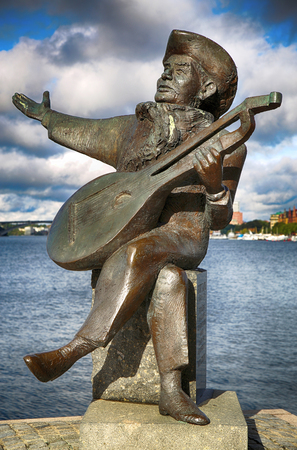 STOCKHOLM, SWEDEN - AUGUST 19, 2016: View of Evert Taube monument with guitar on Gamla stan in Stockholm, Sweden in Stockholm, Sweden on August 19, 2016.のeditorial素材