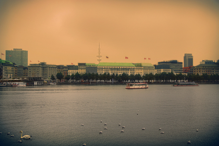 HAMBURG, GERMANY - AUGUST 22, 2016: Panoramic view of The central lake Binnenalster (Inner Alster Lake). Clouds over the modern city and the second largest city in Hamburg, Germany on August 22, 2016.のeditorial素材