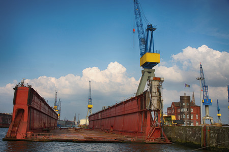 Hamburg, Germany - July 28, 2014: View of port of Hamburg harbor on the river Elbe, large container ships at the Container Terminal. The port of Hamburg is largest seaport in Germanyのeditorial素材