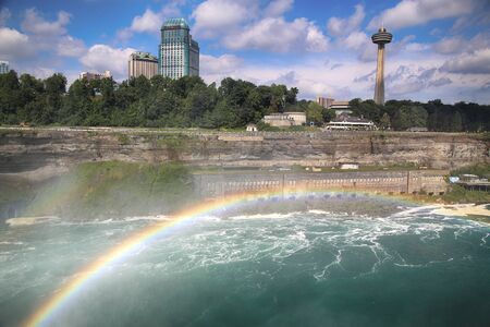 Niagara Falls, USA â August 29, 2018: Beautiful view of Niagara Falls with Rainbow the Canadian side with famous hotels across from the American side, New York State, USAのeditorial素材