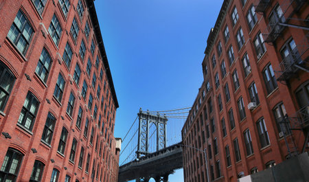 View from Washington street, Dumbo Brooklyn of The Manhattan Bridge at sunset. New York, USA
