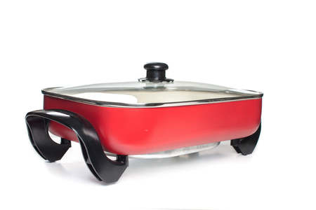 Red steel pan isolated on white background.の写真素材