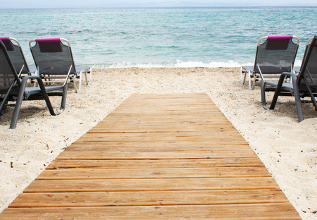 tropical beach and wooden platform.の写真素材