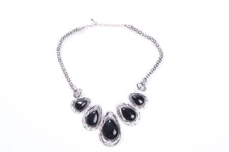 A nice ethnic tracery metallic necklace isolated on white.の写真素材