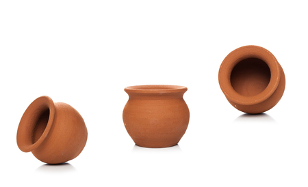 Clay pots used since ancient times on white background.soft clay pot isolated.の写真素材