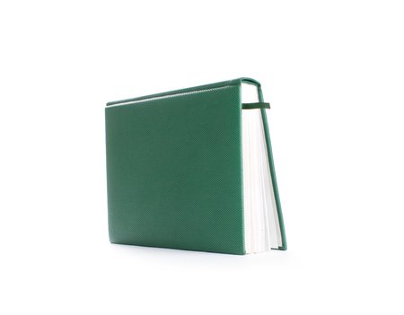 Green  Notebook  isolated on white backgrounの写真素材