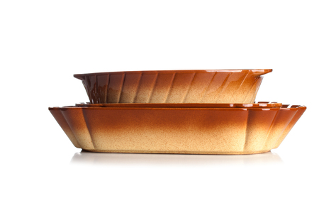 Empty Cast Iron Baking Casserole Dish isolated on white Background.の写真素材