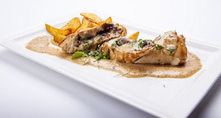 luxury dinner served of Grilled meat with sauce and fish sticks, top view,isolated on white background.の写真素材