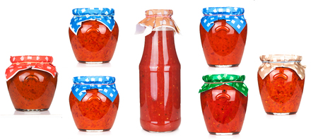 Ajvar, delicious product of roasted red pepper isoated on white background.の写真素材