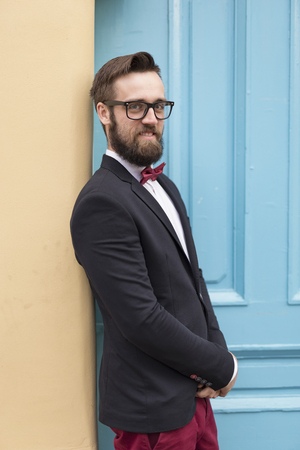Portrait of a bearded young handsome man on his wedding dayの写真素材