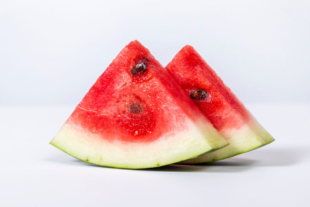 Cold watermelon slices isolated on white background