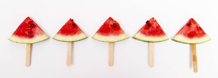 Top view of a watermelon popsicles isolated on white backgroundの写真素材