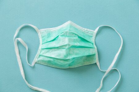 Surgical medical face protection mask as part of prevention gear against bacterial and viral infections; covid-19 prevention medical equipmentの写真素材