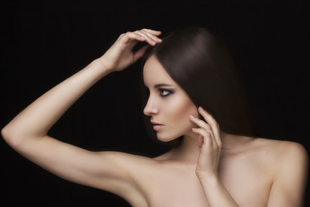 Beauty natural face model with smoky eyes makeup and hair styleの写真素材