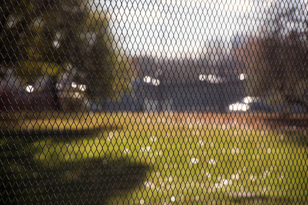 Steel wire mesh fence abstract rhythmic background texture for designの写真素材